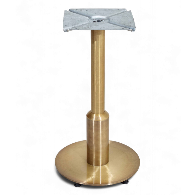 Pied de table central professionnel en finition laiton brossé doré avec base ronde et platine de fixation supérieure.