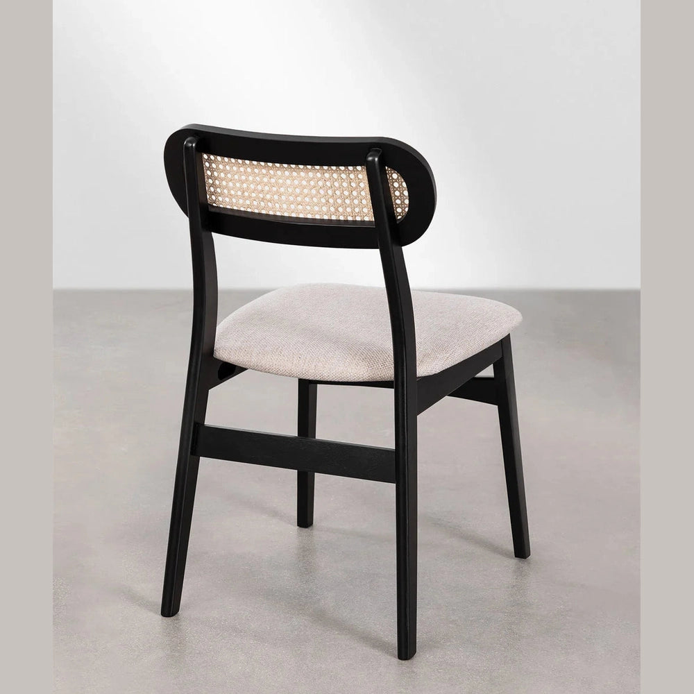 Chaise en rotin et bois Leivel, design naturel et élégant pour salle à manger.