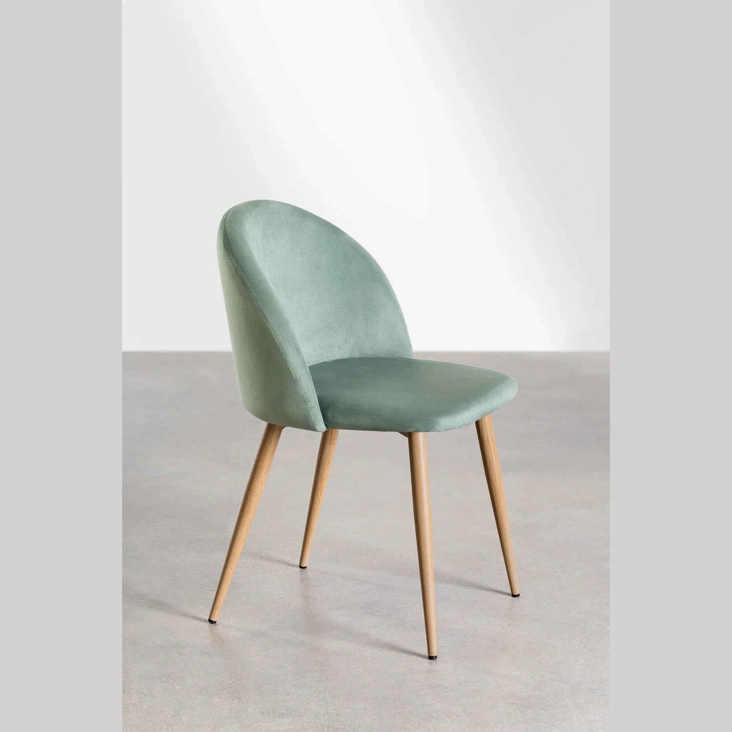 chaise pour HORECA vert clair velours vue de profil 