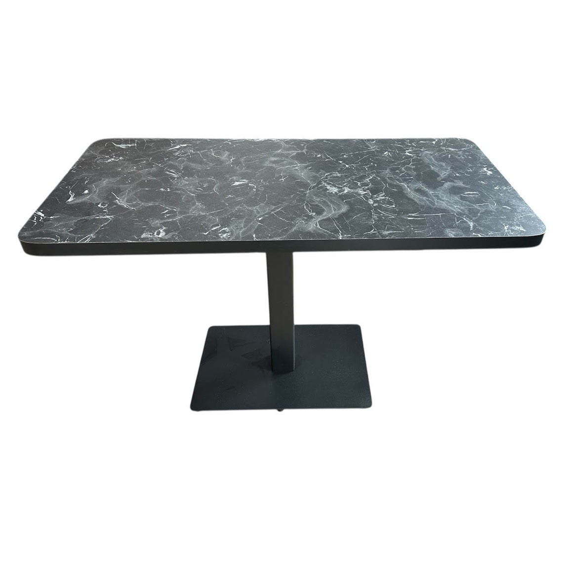 Détail du plateau effet marbre noir de la table Lotus 120×60 cm